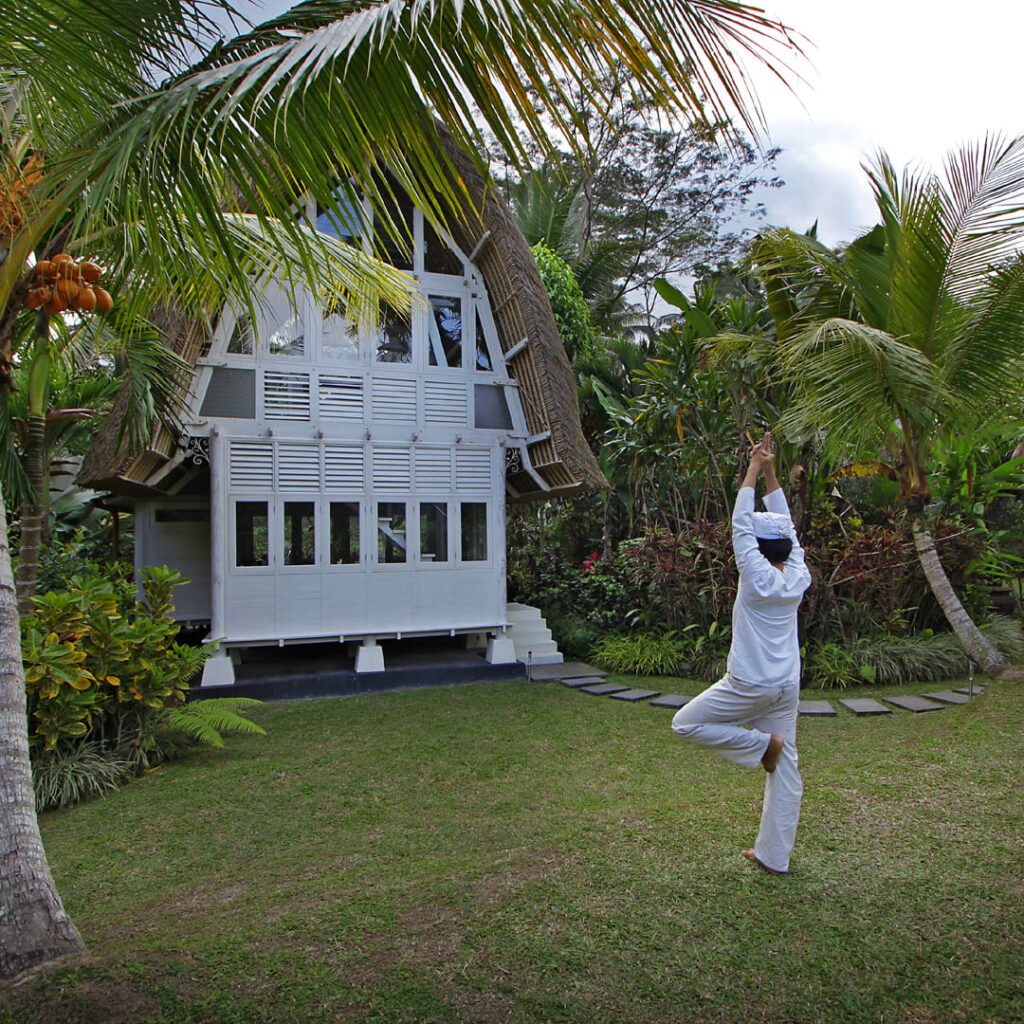 Yoga in the gardens of Villa Jendela di Bali near Ubud, Bali