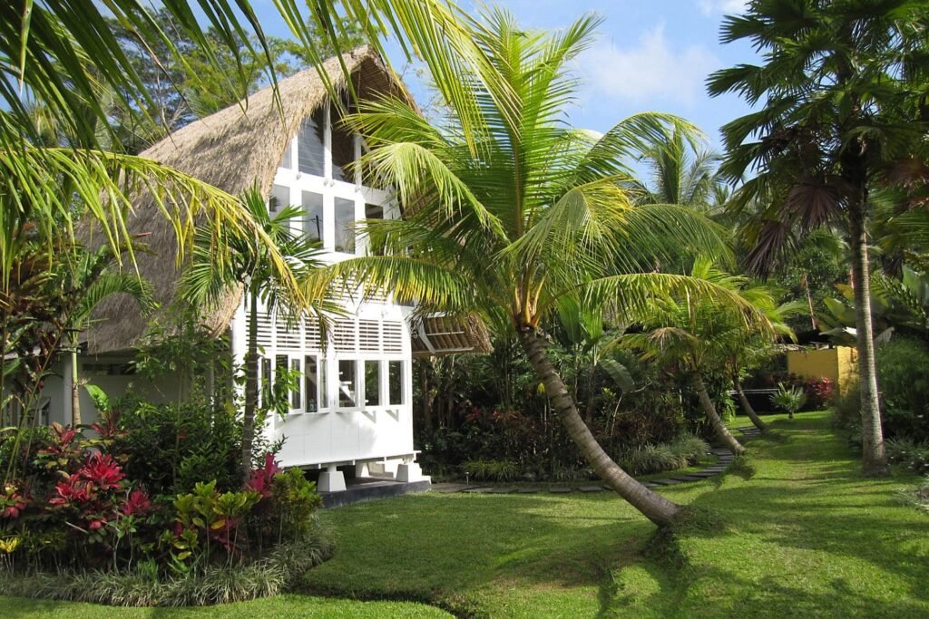 Just one of the 'village' of unique living spaces, The White Elephant bedroom bale has been called Ubud's most romantic villa bedroom